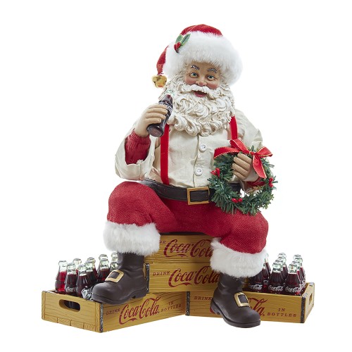 9"coca-cola santa sitting on crates