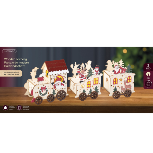 Weihnachtsszene mit einer beleuchteten Holzeisenbahn